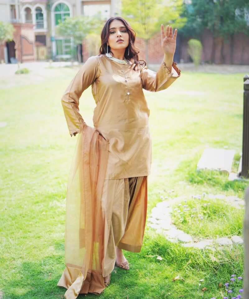 Short shirt with farshi shalwar on golden raw silk paired with organza dupatta – traditional women's outfit