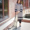 printed lawn shirt beautifully crafted with laces on with plain trousers along with pure tie and dye dupatta