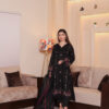 Black fine lawn semi formal dress for women with embroidered neckline, ideal for semi traditional events or wedding guests