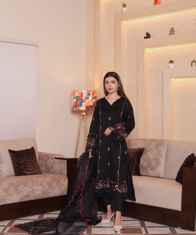 Black fine lawn semi formal dress for women with embroidered neckline, ideal for semi traditional events or wedding guests